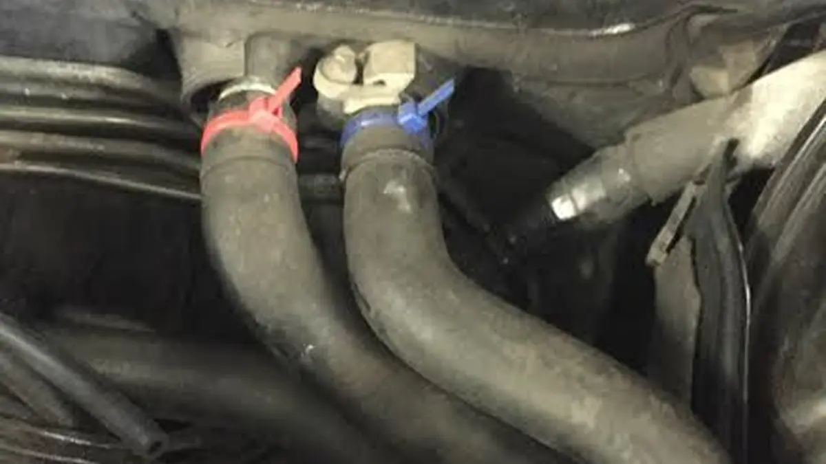 Cooling system parts from a BMW that came back overheating after a repair elsewhere, at our West Springfield shop