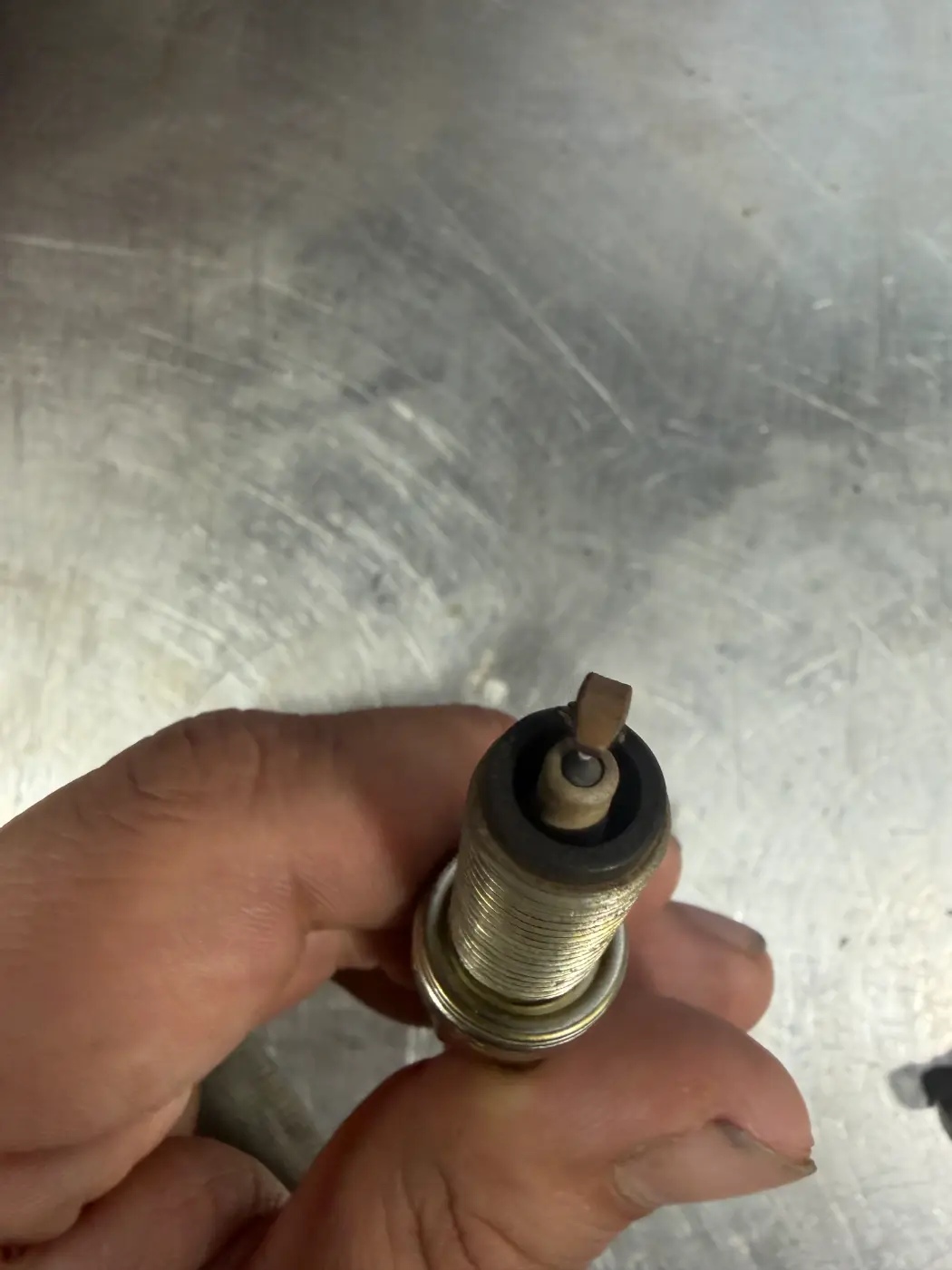 Worn spark plug pulled from an engine with a misfire at our West Springfield shop