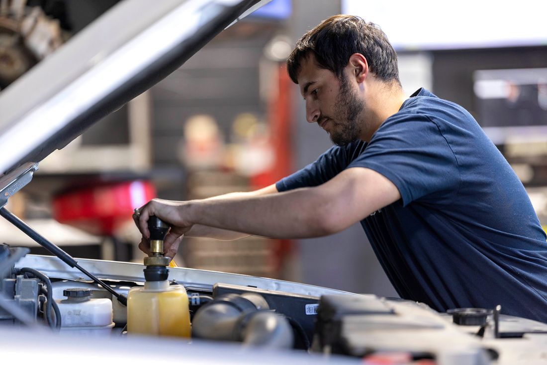 Precision technician testing a cooling system